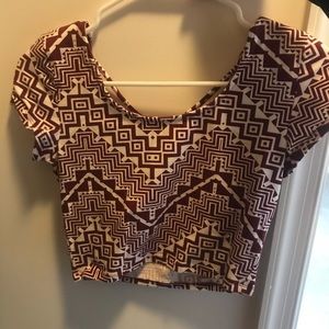 crop top. crosses in back